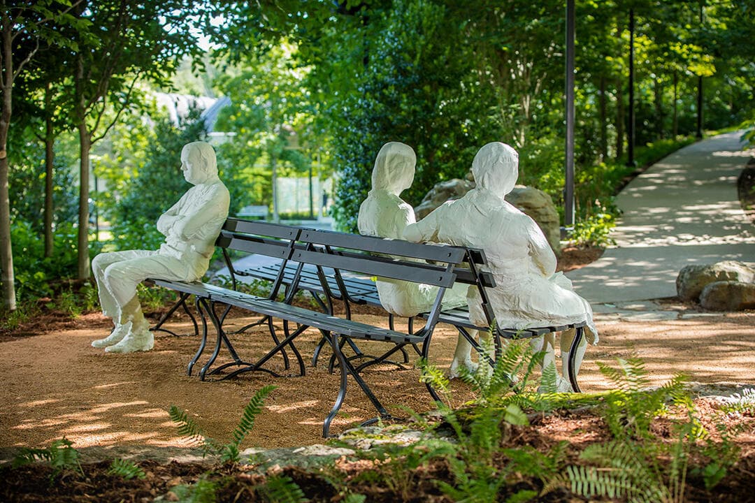 Three People on Four Benches