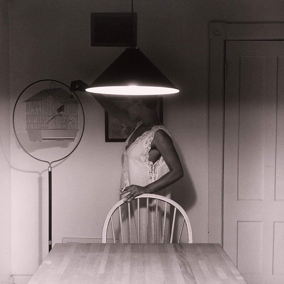 Untitled (Woman feeding bird)