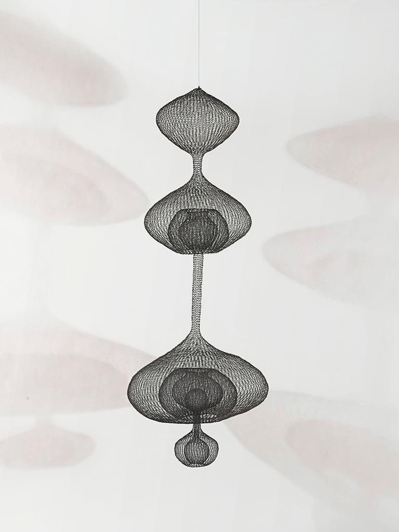 Ruth Asawa (1926 – 2013), Untitled (S.028, Hanging Four-Lobed Continuous Form within a Form), 1960, iron wire, 86 1/2 in. × 32 in. × 32 in. Crystal Bridges Museum of American Art, Bentonville, Arkansas, 2014.8.