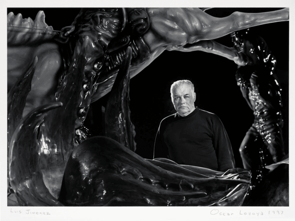 Man Posed Among Abstract Sculptures by Oscar Lozoya 1997